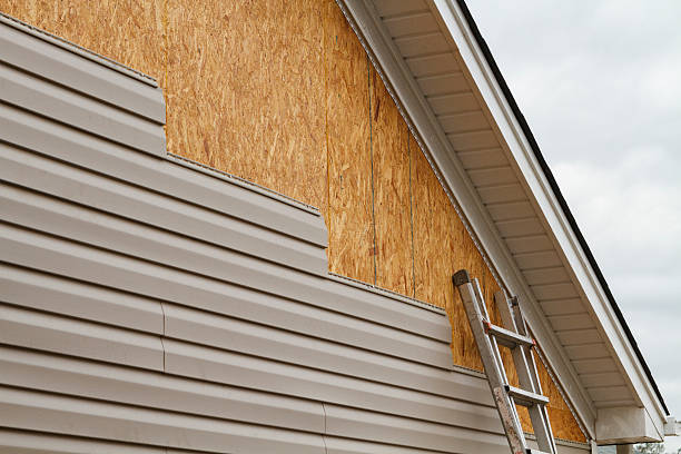 Professional Emergency Siding Repair technician working in Orient, NY